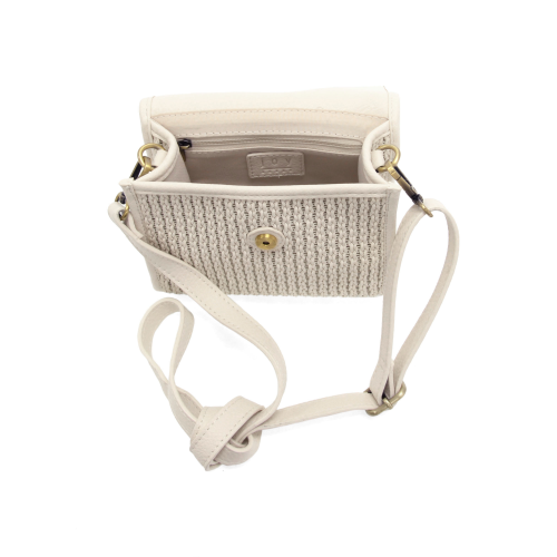 White woven handbag with a strap on a white background