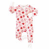 Baby onesie with heart pattern on a white background