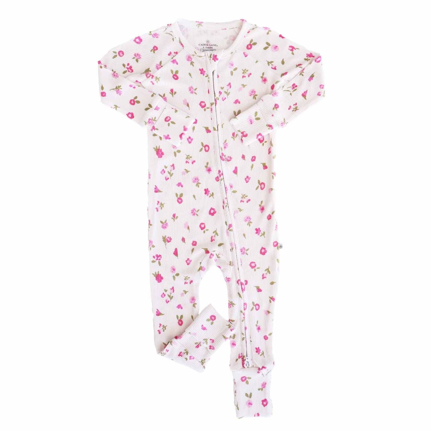 Baby onesie with pink floral pattern on a white background