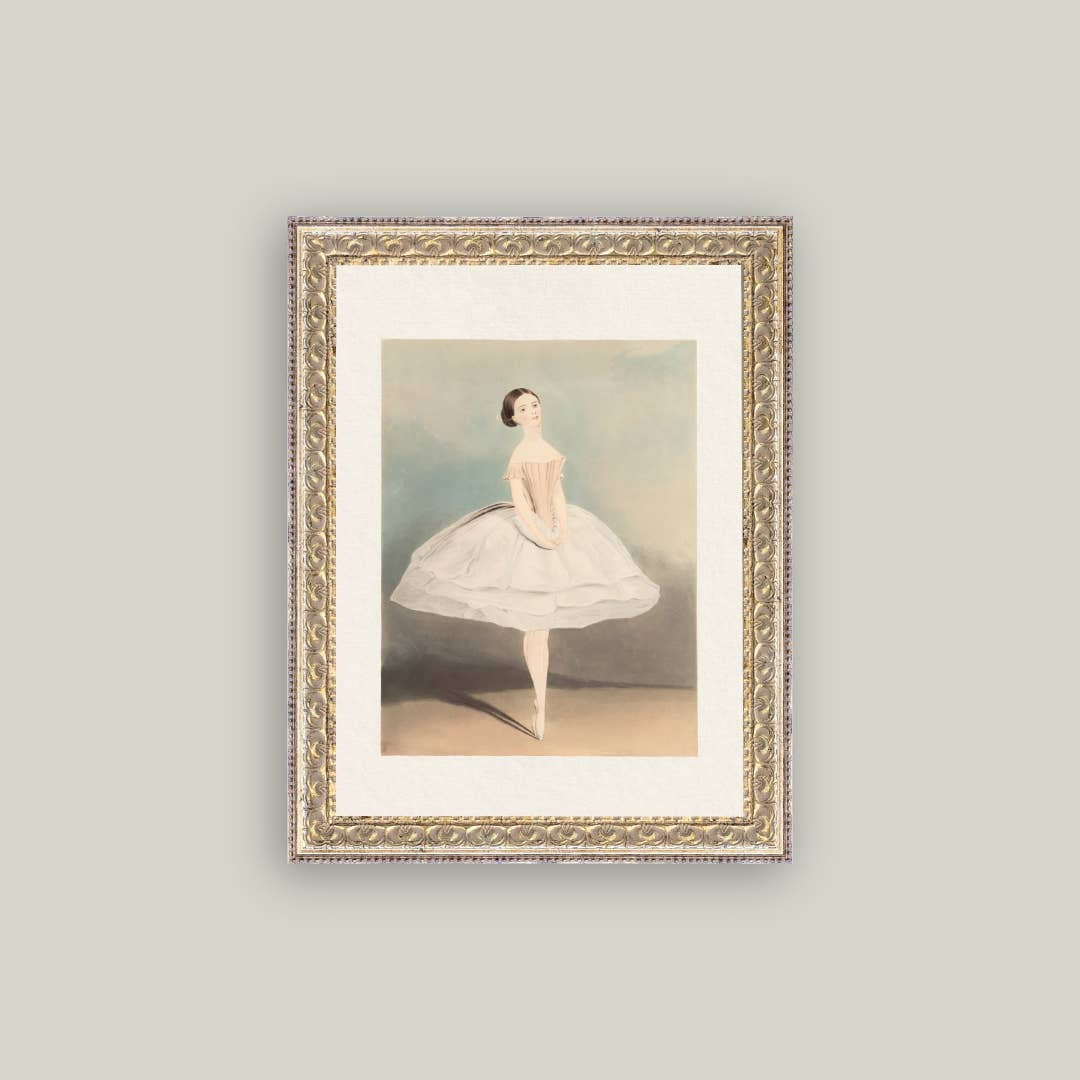 Framed artwork of a ballerina on a gray wall