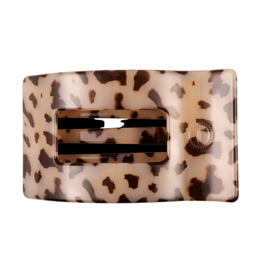 Leopard print hair clip on a white background