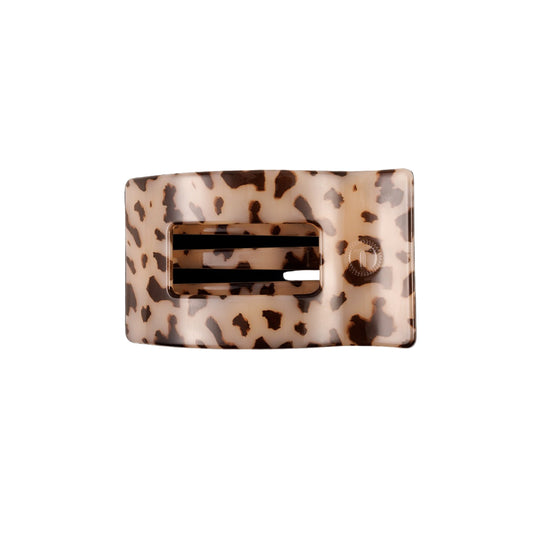 Leopard print hair clip on a white background
