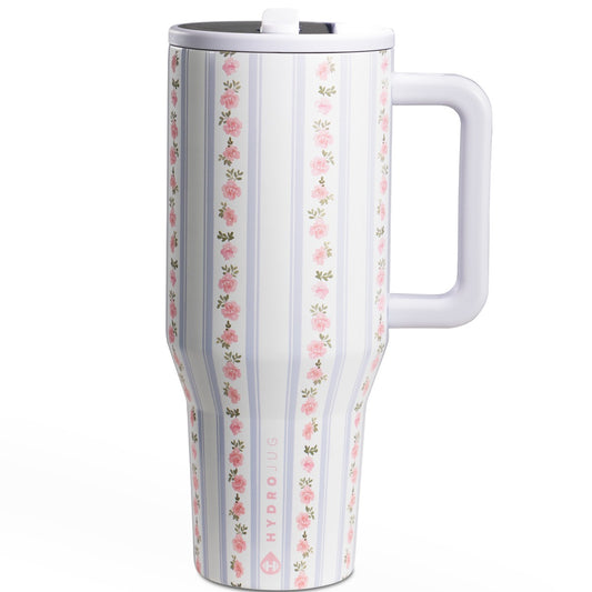 Floral-patterned mug with a white handle on a white background