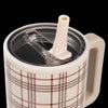 Plaid-patterned mug with a straw lid on a white background