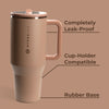 Brown travel mug with 'HydroJug' branding on a brown background