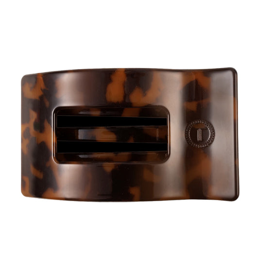 Tortoiseshell hair clip on a white background