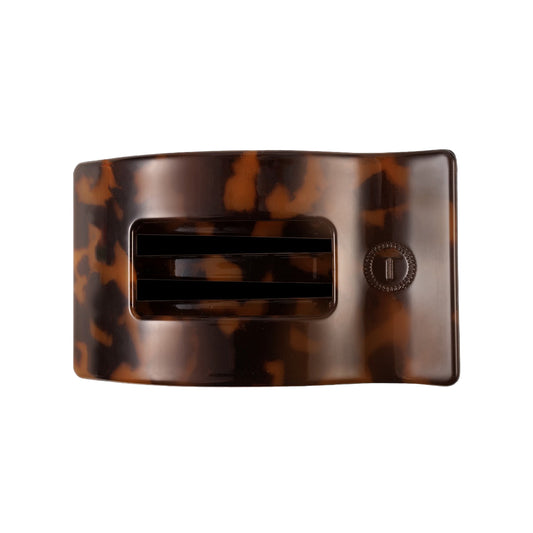 Tortoiseshell hair clip on a white background