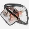 Black waist bag with clear compartment containing makeup items on a white background
