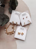 Gold Pearl Bow Earrings