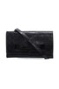 Black clutch bag with a strap on a white background